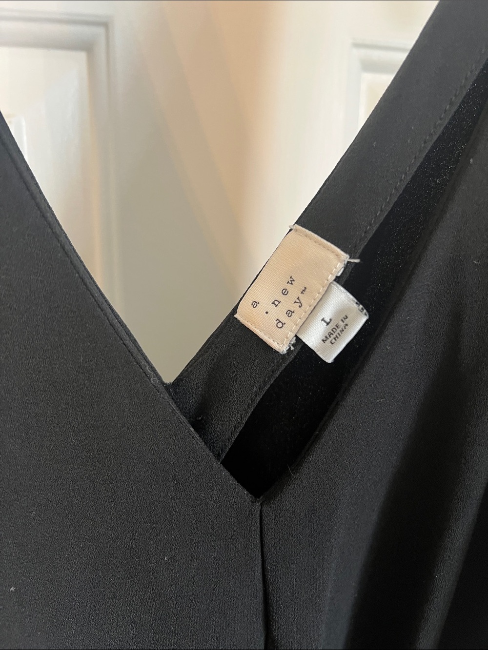 Black V-Neck Sleeveless Jumpsuit with Waist Tie. A New Day-L - Picture 2 of 3